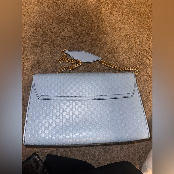 It’s a Gucci Emily chain flap GG shoulder bag (baby blue) - Picture 3 of 8
